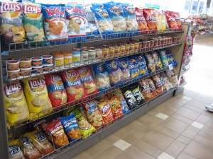 Bakery shelves are perfect for displaying chips and dips.